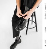 Black leather boots